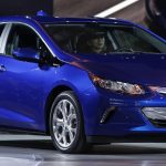 GM Bows to Dealer Pressure, Announces New Hybrid Models Amid Slowing EV Sales